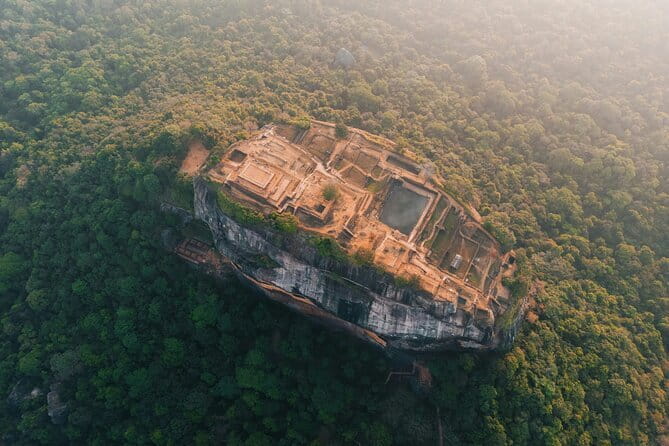 4 Days Private Tour In Sri Lanka - Day 2: Painted caves, a royal fortress, and Kandyan dance