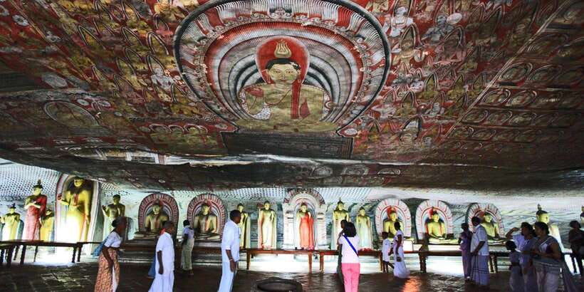Dambulla: Cave Temple and Village All-Inclusive Tour - Dambulla’s Five Painted Caves