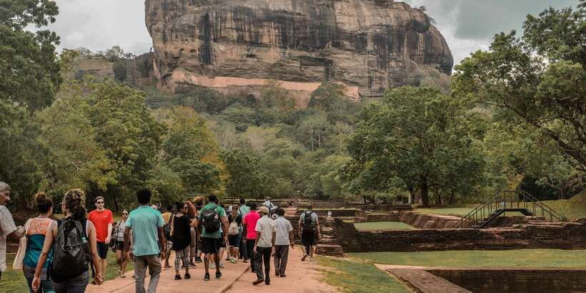 From Colombo: Sigiriya and Dambulla Full-Day Private Tour - Sigiriya Rock Fortress and the lion-paw entrance