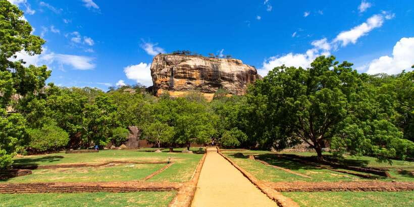 From Kandy: Sigiriya Rock & Dambulla Cave Temple Adventure - Dambulla Cave Temple after the climb