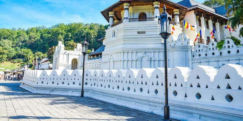 From Sigiriya: Kandy Transfer with Dambulla and Spice Garden - Entering Dambullas Royal Cave Temple