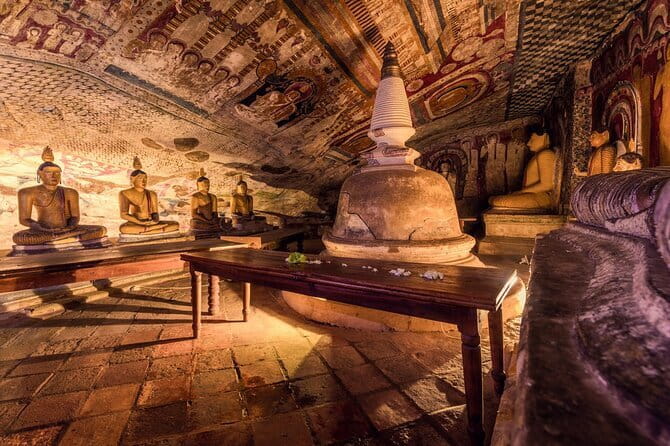 Kandy Sigiriya Rock and Village Safari Day Trip - Dambulla’s painted caves and Buddha figures
