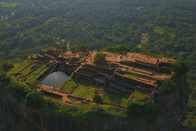 Sigiriya Rock and Dambulla Cave All Inclusive Private Day Trip - Climbing the fifth-century fortress at Sigiriya