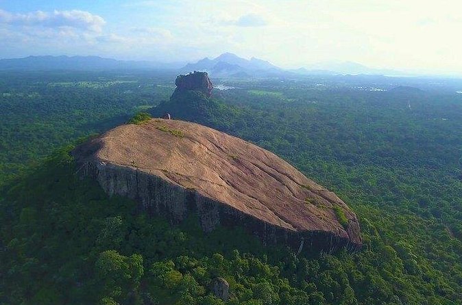 World Heritage Sigiriya and Dambulla Day Tour - Dambulla Cave Temple and its painted interiors
